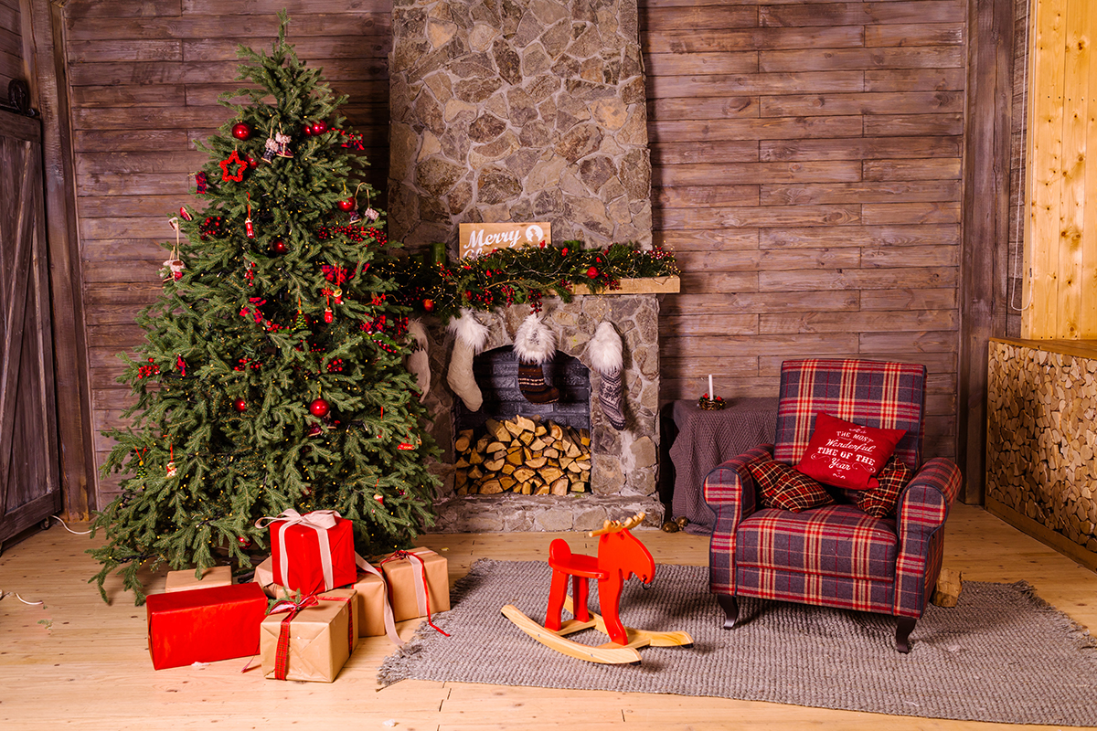 Zet een stapje achteruit en fotografeer de kerstboom en de omgeving